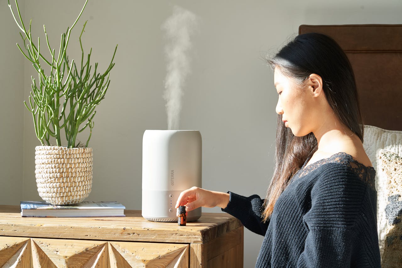 woman using air purifier