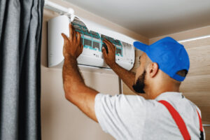 rsz 1professional repairman installing air conditioner 2023 11 27 05 16 50 utc